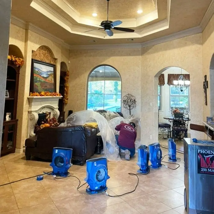 setting-up-drying-fans-in-living-room